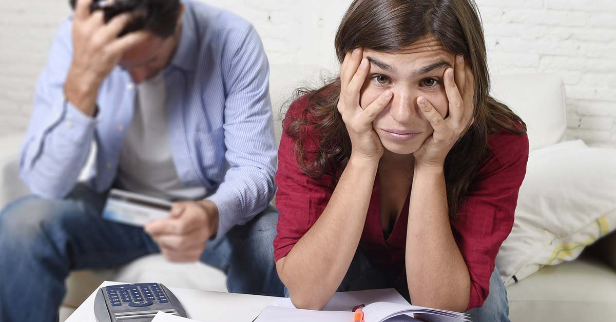 Image-of-a-couple-overwhelmed-with-debt