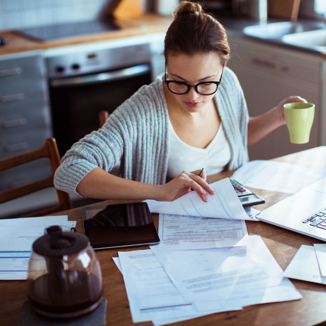 woman organizing paperwork