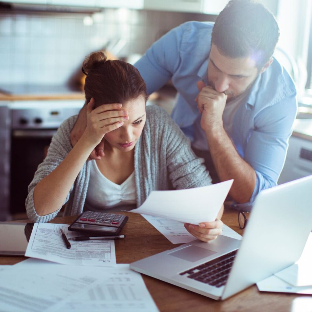 frustrated couple at computer