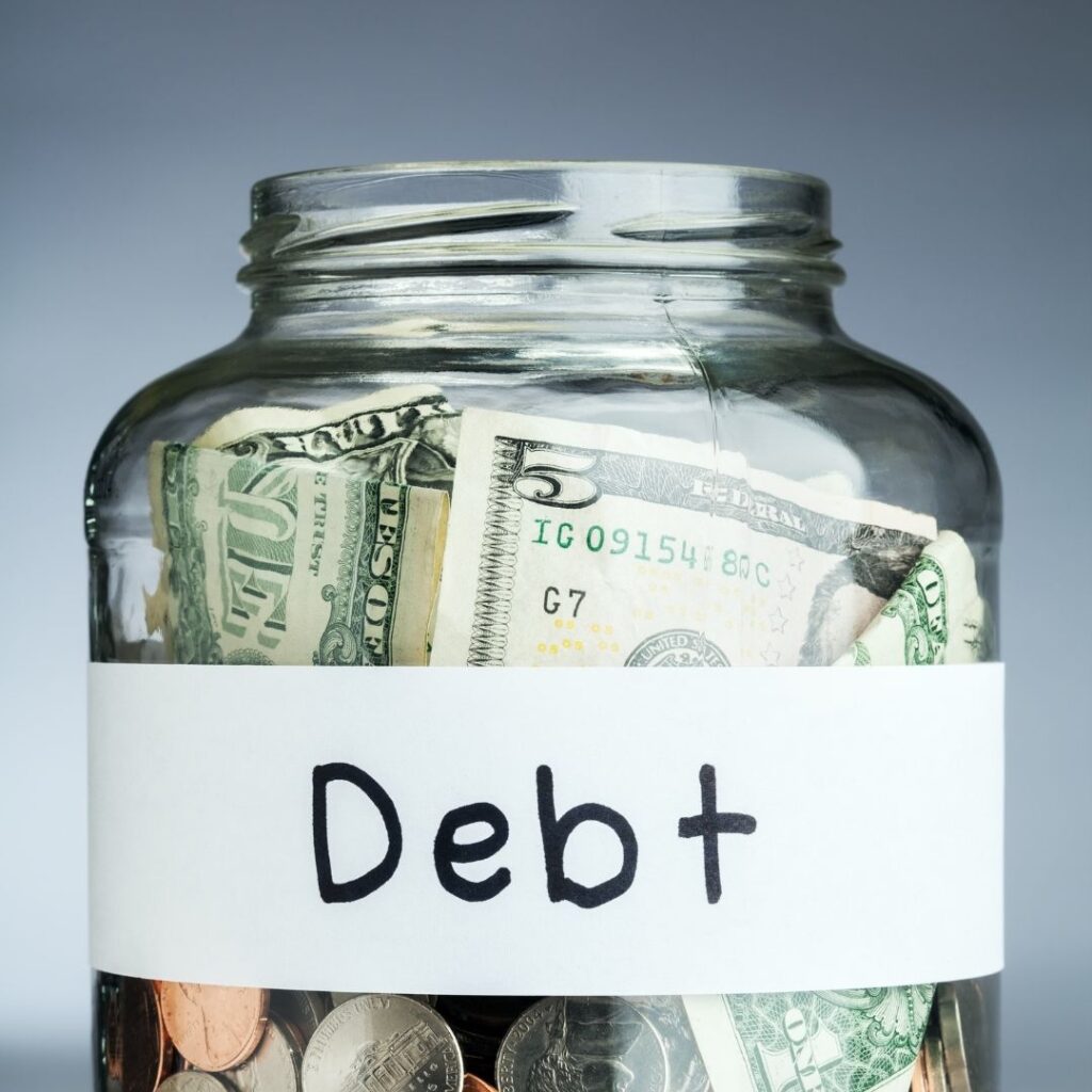 jar of cash labeled debt