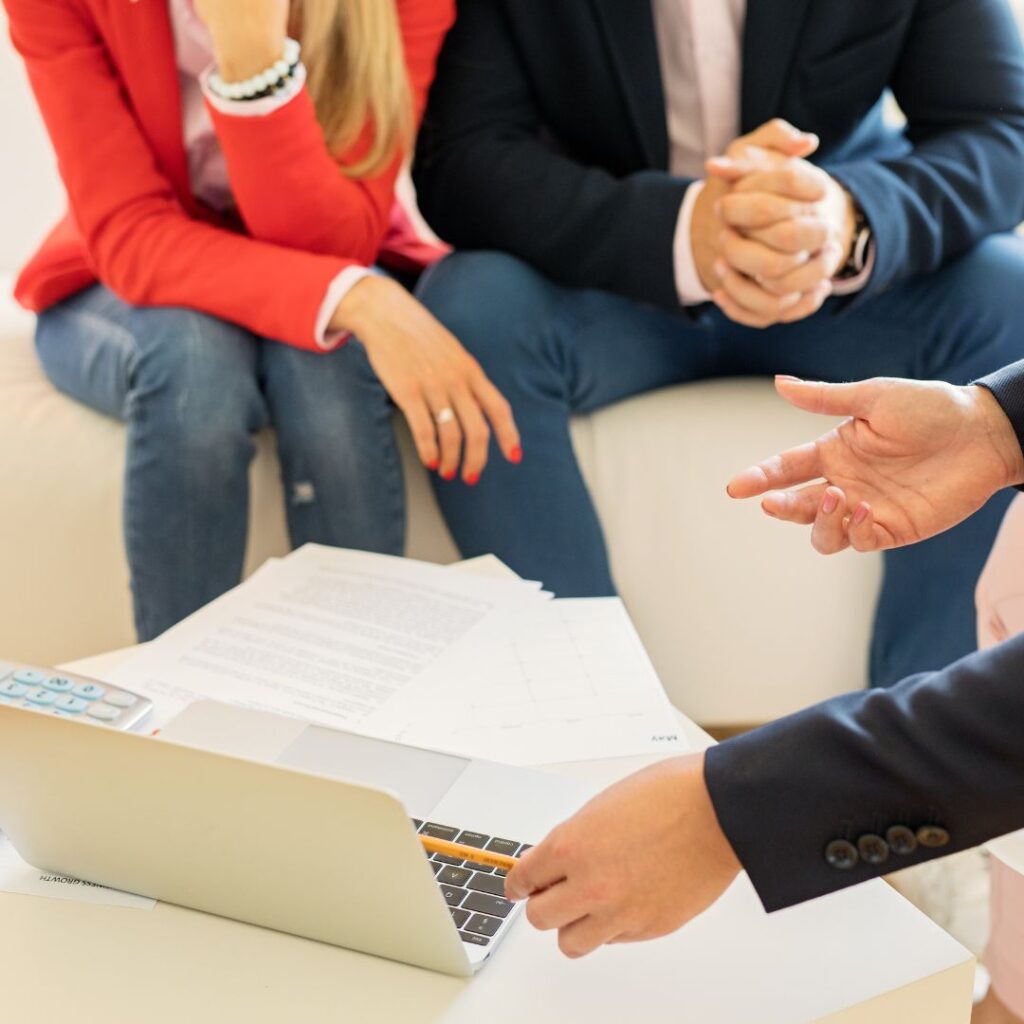 credit consultant talking to couple