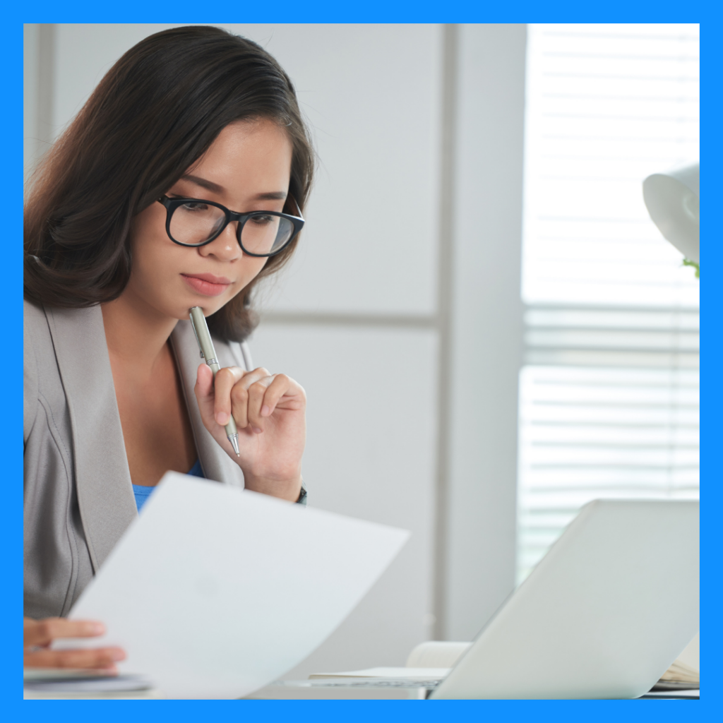 image of a woman reading a credit report