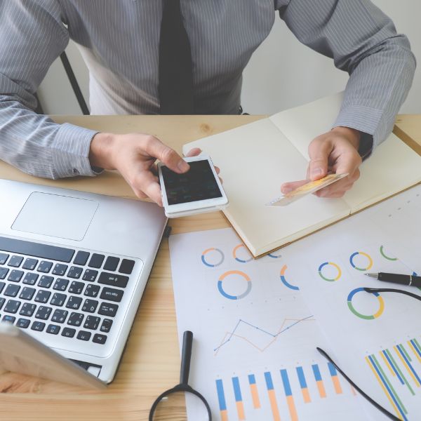 A person going over various charts